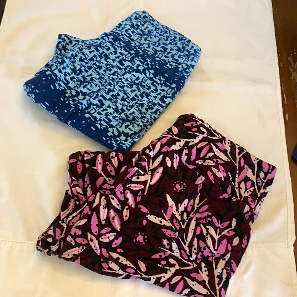 Two pair of Lularoe leggings Purple and blue designs One size